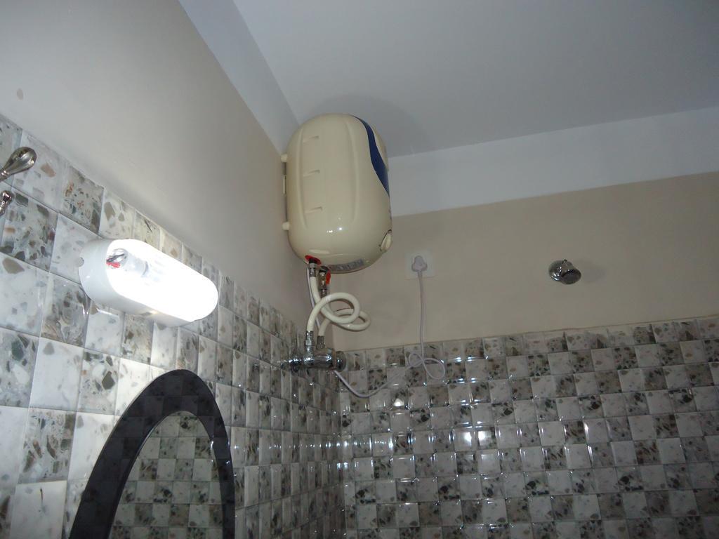 Hotel Debjyoti Силигури Номер фото